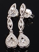 Lot 2288 - A pair of modern 9ct white gold and diamond...