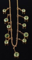 Lot 2295 - A 14ct gold finelink neck chain, supporting...