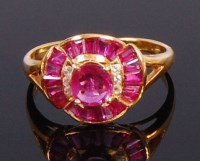 Lot 2326 - A modern 18ct gold, ruby and white sapphire...