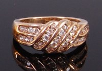 Lot 2328 - A modern 9ct gold multi-diamond set dress ring,...