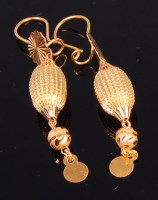 Lot 2334 - A pair of high carat gold ear pendants, having...