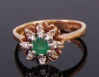 Lot 2342 - A 9ct gold, emerald and diamond flower head...