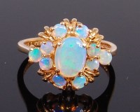 Lot 2344 - A modern 9ct gold and cabochon opal set flower...