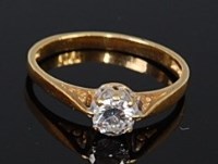 Lot 2182 - An 18ct gold diamond solitaire ring, the claw...