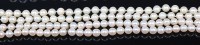 Lot 2197 - A cultured and knotted pearl single string...