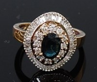 Lot 2211 - A 9ct gold, sapphire and diamond cluster ring,...