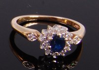 Lot 2354 - A 9ct gold, sapphire and diamond point set...