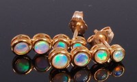 Lot 2365 - A pair of 9ct gold and opal set ear studs,...