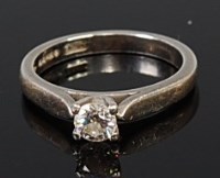 Lot 2226 - A platinum diamond solitaire ring, the four...