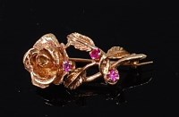 Lot 2240 - A modern 18ct gold and ruby set brooch,...