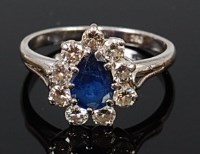 Lot 2257 - An 18ct white gold, sapphire and diamond...