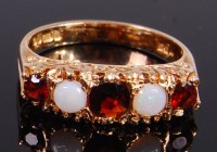 Lot 2369 - A 9ct gold, opal and garnet set dress ring, as...