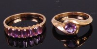 Lot 2011 - A modern 9ct gold and amethyst set dress ring...