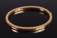 Lot 2016 - A 9ct hollow gold hinge bangle being square...