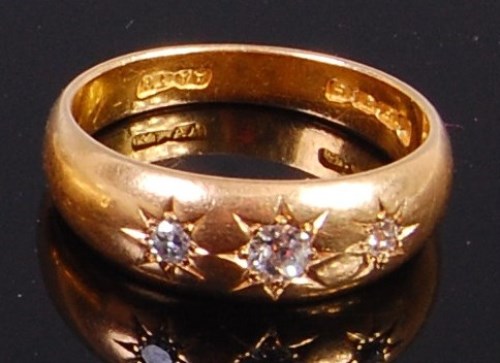 Lot 2024 - An 18ct gold and diamond gypsy ring, the...