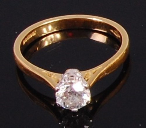 Lot 2036 - An 18ct gold diamond solitaire ring, the claw...