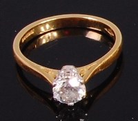 Lot 2036 - An 18ct gold diamond solitaire ring, the claw...