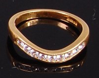 Lot 2041 - An 18ct gold and diamond set wishbone ring...