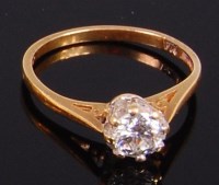 Lot 2053 - An 18ct gold diamond solitaire ring, the claw...