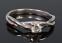 Lot 2058 - A 9ct white gold diamond solitaire ring, the...
