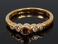 Lot 2066 - A modern 18ct gold diamond five stone ring,...