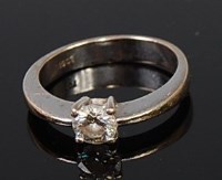 Lot 2096 - An 18ct white gold diamond solitaire ring, the...