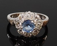 Lot 2113 - A platinum, pale blue sapphire and diamond...