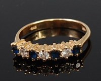 Lot 2135 - A 14ct gold, sapphire and diamond dress ring,...