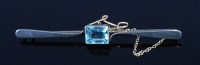 Lot 2140 - A 9ct gold and white metal faced aquamarine...