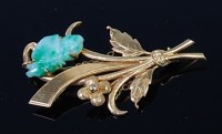 Lot 2142 - A 14ct gold and carved jade set leaf and...