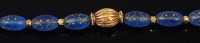 Lot 2155 - A Bohemian glass and high carat gold beaded...