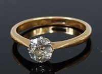 Lot 2170 - An 18ct gold diamond solitaire ring, the claw...
