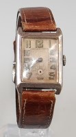 Lot 2177 - An Art Deco gents silver cased tank watch, the...