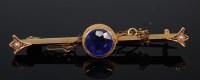 Lot 2183 - A 15ct gold, synthetic sapphire and seed pearl...
