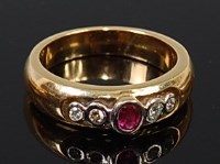 Lot 2189 - An 18ct gold, ruby and diamond ring, arranged...