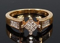 Lot 2201 - An 18ct gold diamond ring, the centre lozenge...