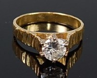 Lot 2202 - A modern 18ct gold diamond solitaire ring, the...