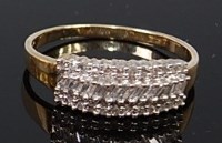 Lot 2203 - A 9ct gold diamond dress ring by QVC, set with...