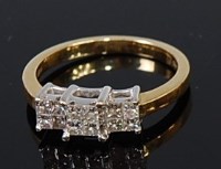 Lot 2210 - A modern 18ct gold and diamond dress ring,...