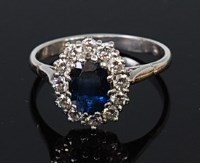 Lot 2212 - An 18ct white gold, sapphire and diamond...