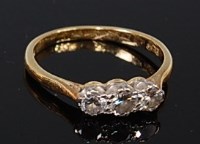 Lot 2214 - A Mappin & Webb 18ct gold diamond three stone...