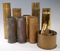 Lot 550 - A collection of WW I and later brass shell...