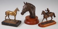 Lot 587 - A bronzed resin bust of a racehorse on a socle...