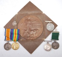Lot 499 - A family group of medals to include WW I...