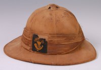 Lot 303 - A Foreign Service Wolseley pattern pith helmet...