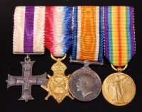 Lot 304 - A Geo.V. Military Cross group of four to...