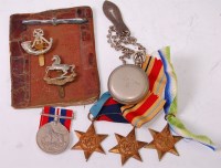 Lot 338 - A group of four WW II medals to include...