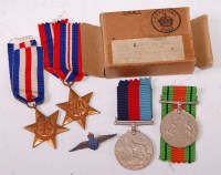 Lot 368 - A WW II group of four medals to include...