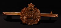Lot 387 - A 9ct gold Royal Engineers bar brooch, 4.2cm.