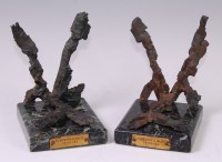 Lot 301 - A pair of marble mounted bookends made from...